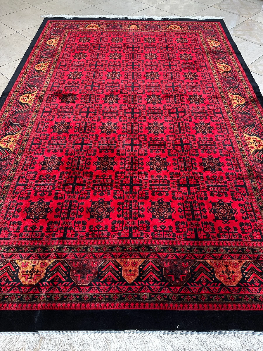 فرش طرح بلوچ کد ۶۶۱۲۷ با رنگبندی قرمز و حاشیه مشکی